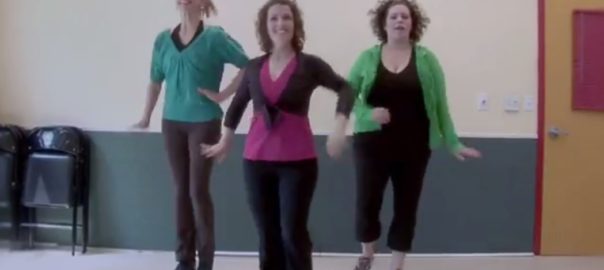 Three women are dancing