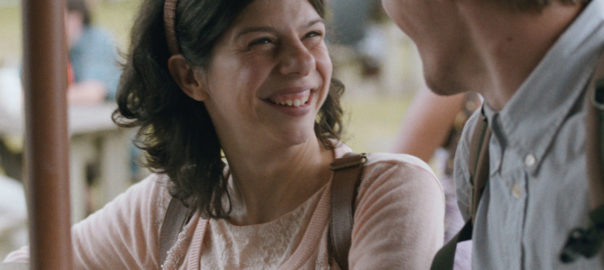 A woman looks at a man