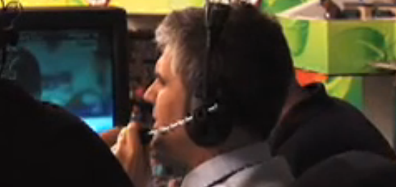 A man calls play by play for a baseball game