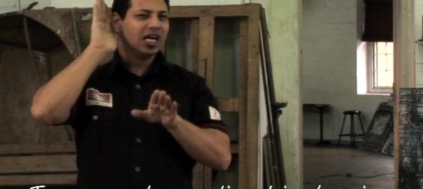A man motions with his hands