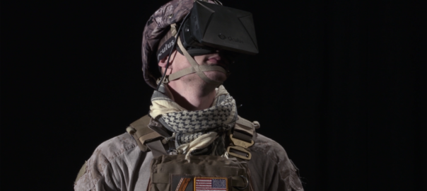 A man in a army uniform gazes upward with a VR headset.